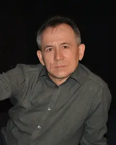 Александр Исаев